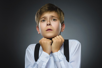 Closeup Scared and shocked little boys. Human emotion face expression. Life perception achievement...