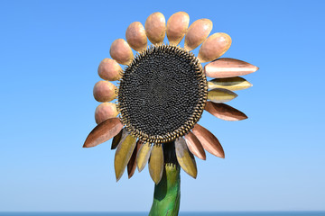 Statue of copper flower sunflower
