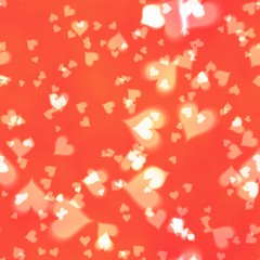 Abstract bokeh heart background on pink color.