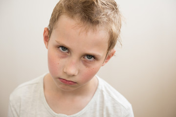 Portrait of sad boy with expressive eyes