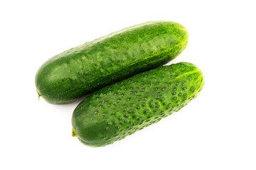 Fresh and ripe cucumbers isolated on white background.