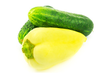 Bell pepper and cucumbers isolated on white background.