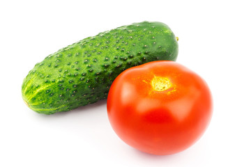 Tomato and cucumber isolated on white background.