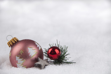Christmas ball in the snow