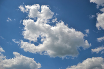 Fototapeta na wymiar Blue sky with clouds on sunny day