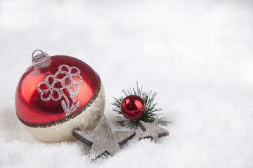 Christmas ball in the snow
