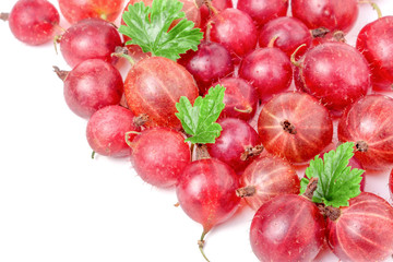 red gooseberries with leaves isolated on white background