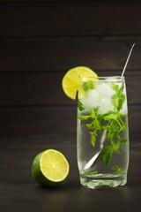 Homemade lemonade with fresh lemon and mint. Cool, refreshing dip in the hot summer. 