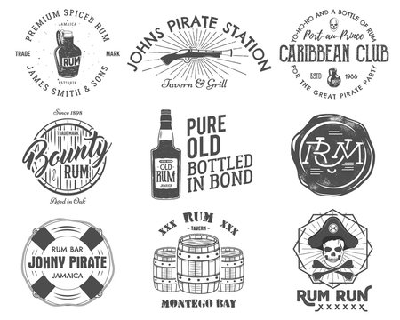 Set of vintage handcrafted emblems, labels, logos. Isolated on a white background. Sketching filled style. Pirate and sea symbols - old rum bottles, barrels, skull, pistol. Vector