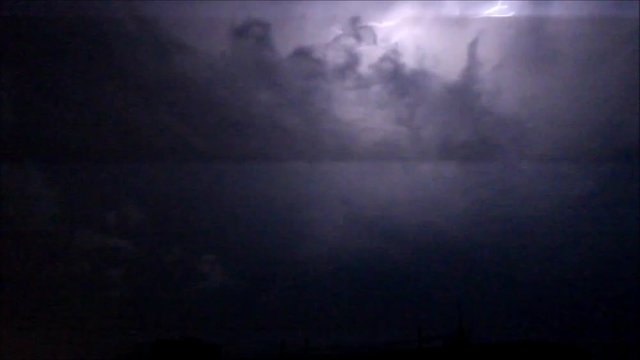 night lightning in the clouds before the storm and the storm July 14, 2016 Moscow