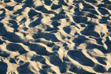 Surface of a beach sand  in the summer time