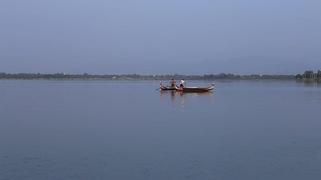 Tradition boat in Amarapura lake at U Bein Bridge