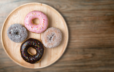 donut on wood plate