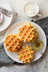 homemade waffles with honey on plate