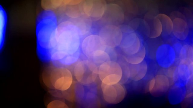 Blue, blurred, bokeh lights background. Abstract sparkles
