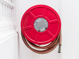 Fire hoses packed on the wall