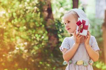 little girl with gift box