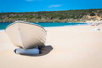 boat at bolonia beach a coastal village in the municipality of T