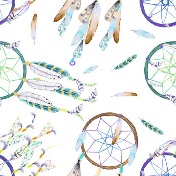 Seamless pattern with dreamcatchers and feathers in the air, hand drawn in watercolor on a white background