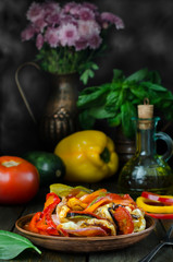Fresh French ratatouille in crockery plate, still life