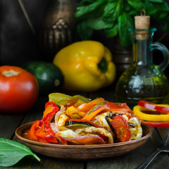 Fresh French ratatouille in crockery plate, still life