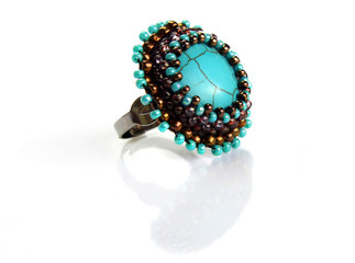 Ring with turquoise and beds