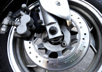 Wear brake disc on the front wheel of motorcycle 