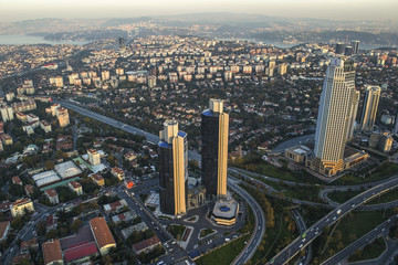 Fototapeta na wymiar ISTANBUL, TURKEY - AUGUST 23: Skyscrapers and modern office buildings at Levent District. With Bosphorus background. August 23, 2014 in Istanbul, Turkey.