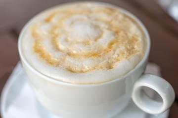 Cup of Cappuccino Coffee with a delicious crema.