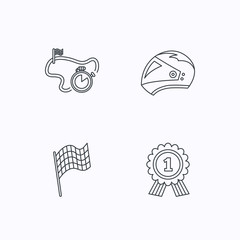 Race flag, motorcycle helmet and award medal.