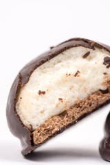 Chocolate round cookies white cream with copy space on white bac