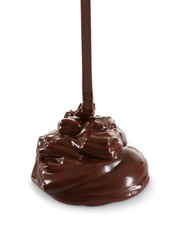 Pouring melted chocolate, isolated on white