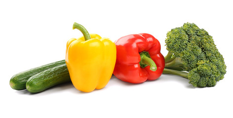 Fresh peppers, broccoli and cucumber, isolated on white
