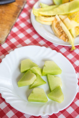 Sliced melon isolated over white background with copy space