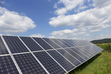 Solar Power Station on the summer flowering Meadow 