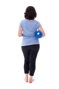 back view of mature woman in sportswear with yoga mat isolated o