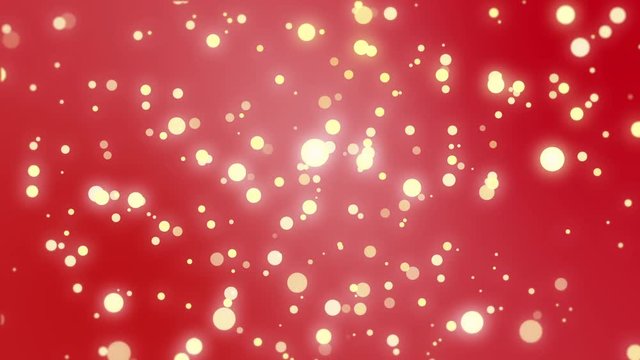 Sparkly light particles moving across a red gradient background
