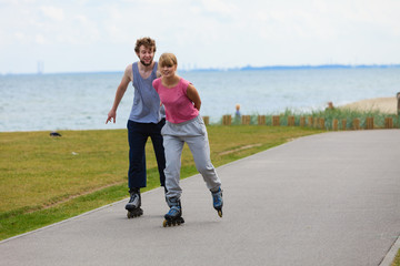 Teens together on skating date.