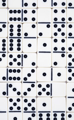 Background from white dominoes pieces