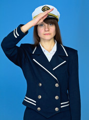 Girl in a sea uniform salutes