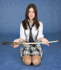 Girl sitting in a lap stretches us a sword