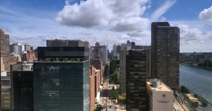 NEW YORK - Circa July, 2016 - A unique aerial view of buildings on York Avenue in Manhattan as seen from the Roosevelt Island Tramway.  	