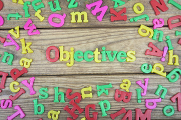 Objectives on wooden table