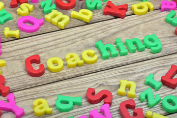 Fototapeta premium Coaching on wooden table
