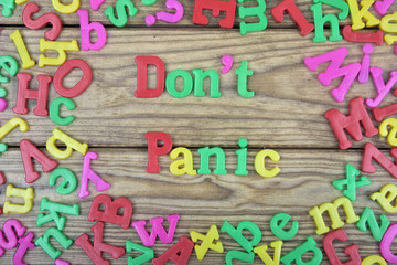 Don't Panic on wooden table