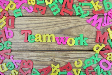 Teamwork on wooden table