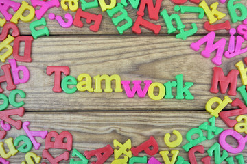 Teamwork on wooden table