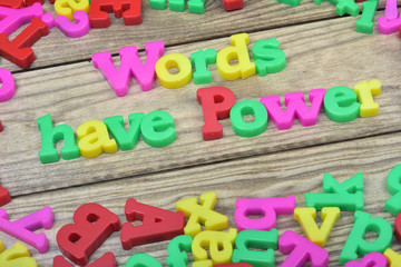 Fototapeta premium Words have power on wooden table