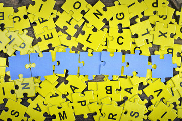 Puzzle on wooden table