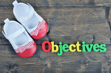 Objectives on wooden table